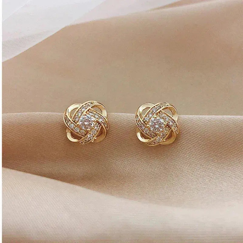 Fabienne | Boucles d'Oreilles Spirale Dorées à Cristaux